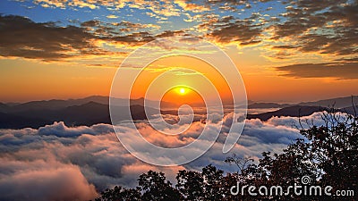 Seoraksan mountains is covered by morning fog and sunrise in korea. Stock Photo