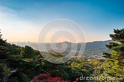 Seoul city at sunset from Yongamsa Temple in Bukhansan National Park, Seoul, South Korea Stock Photo