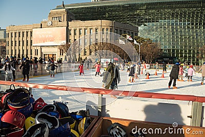 Ice skaters enjoying a sunny December afternoon Editorial Stock Photo