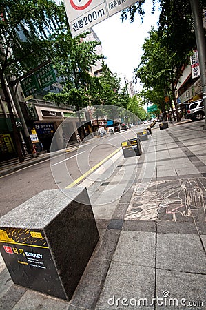 Seoul street with national artwork stones Editorial Stock Photo