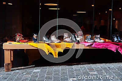 Various colourful stylish design shoes and sneakers Editorial Stock Photo