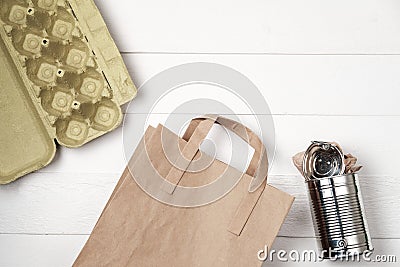 Separate garbage collection: paper bag, egg packing and aluminum Stock Photo