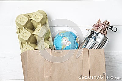 Separate garbage collection: paper bag, egg packing and aluminum Stock Photo
