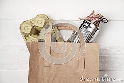 Separate garbage collection: paper bag, egg packing and aluminum Stock Photo