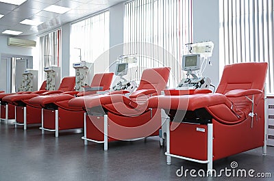 Separating apparatus and daybeds set at City blood transfusion station for taking blood from donors Stock Photo