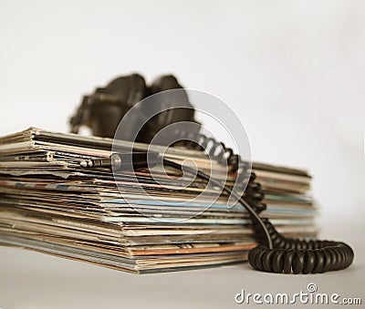 Sepia-style photo of vinyl records and vintage headphones Stock Photo
