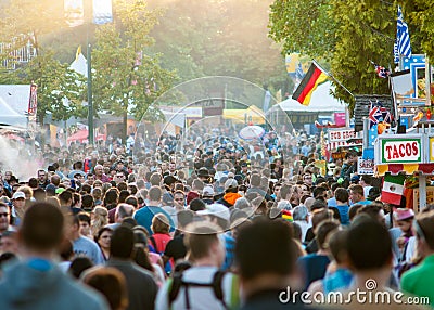 Sept. 2, 2012 - Vancouver, Canada: Crowds of people walking past diverse food stalls at annual PNE fair, late afternoon. Editorial Stock Photo