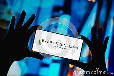 September 20, 2023, Brazil. In this photo illustration, the Evergreen Bank Group logo is displayed on a smartphone screen Cartoon Illustration