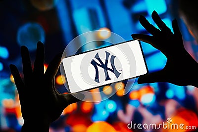 September 9, 2023, Brazil. New York Yankees logo is displayed on a smartphone screen. It is a Cartoon Illustration