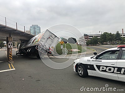 14 September 2019 Durham North Carolina USA Truck of semi truck trailer rolled over crash crashed accident hits bridge Editorial Stock Photo