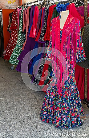 September 9, 2019, El Rocio, Andalusia, Spain. Shop with traditional colorful spanish flamenco dresses Editorial Stock Photo