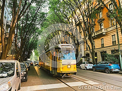 September 25, 2019 Italy. Milan. The yellow retro old tram of Milan in mint condition, still operates. Famous vintage tram in the Editorial Stock Photo
