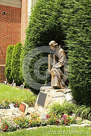 September 11 Memorial - Bronze statue of Jesus Christ holding World Trade Center buildings Editorial Stock Photo