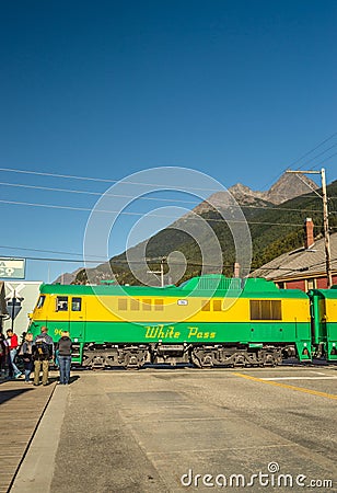 September 15, 2018 - Skagway, AK: WhitePass Railway train stopped at Broadway Street crossing. Editorial Stock Photo