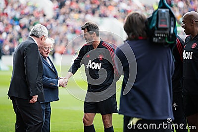 Ireland President Michael D. Higgins greets Roy Keane at Pairc Ui Chaoimh pitch for the Liam Miller Tribute match Editorial Stock Photo