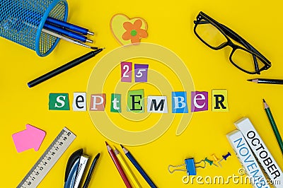 September 25th. Day 25 of month, Back to school concept. Calendar on teacher or student workplace background with school Stock Photo