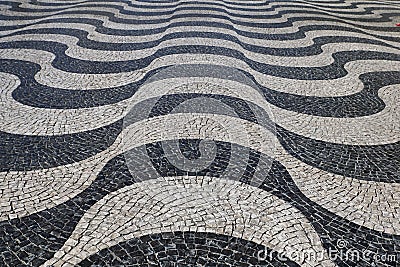 Lisbon, Portugal: Wavy paving stones pattern in Lisbon /Portugal Stock Photo