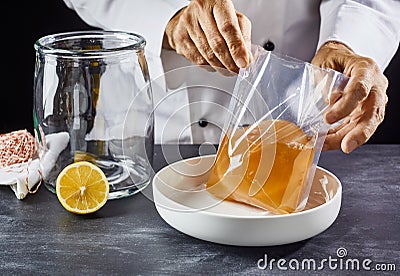 Sequence of man making homemade kombucha Stock Photo