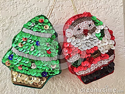 Sequined holiday ornaments Stock Photo