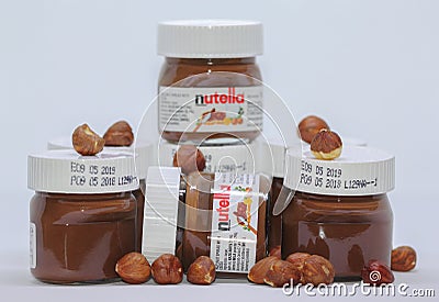 Serbia; Kragujevac; November 4, 2018; Small nutella jars with hazelnuts isolated on white Editorial Stock Photo