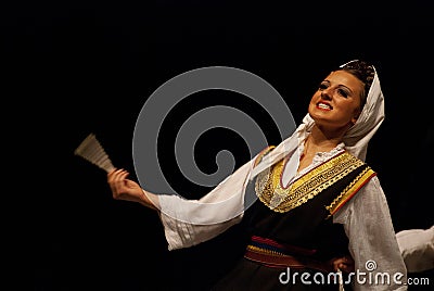 Serbian woman folk dancer isolated on black Editorial Stock Photo