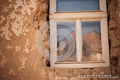 SEREDNIE, UKRAINE - MARCH 09, 2011: window to the real life of poverty and misery Editorial Stock Photo