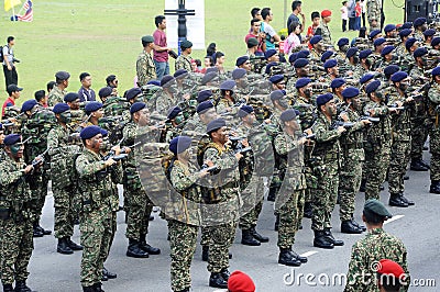 Malaysian soldiers in uniform and fully armed. Editorial Stock Photo