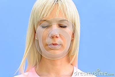 Serene woman with her eyes closed relaxing Stock Photo