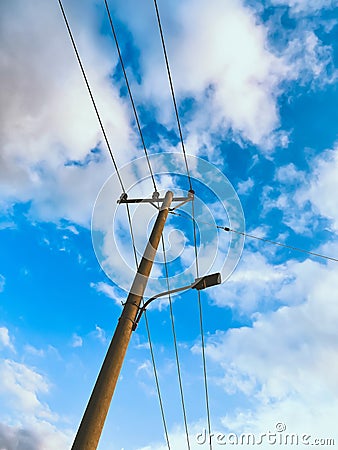 A serene blue sky stretches endlessly, adorned with wisps creating a tranquil and captivating backdrop for your wallpaper Stock Photo