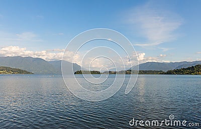 Serene panorama of the calm waters of Panguipulli Lake, from the village of Panguipulli. Patagonian area, Chile Stock Photo