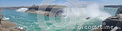 Serene scene of Niagara Horseshoe Falls, American Falls, and Horn Blower Maid of the Mist Boat Stock Photo