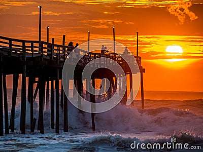 Sunrise over fishing pier at North Carolina Outer Banks Editorial Stock Photo