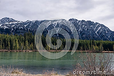 Serene sunrise at the Spray Lakes Reservoir is a reservoir in Alberta, Canada Stock Photo