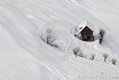 Serene winter landscape and a small cottage Stock Photo