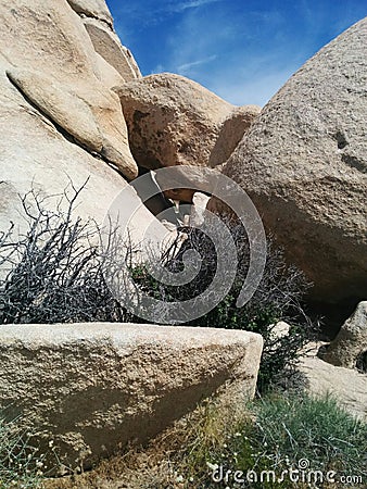 Series of balanced rocks creates tunnel Stock Photo