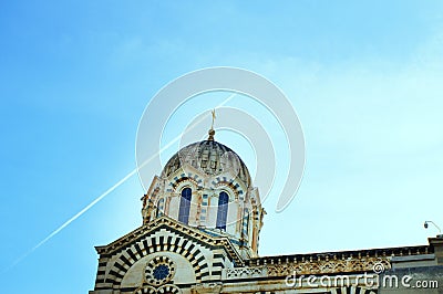 A series of 8 photos - a trace in the sky from the plane flying over Notre Dame de La garde Cathedral in Marseille, the Symbol of Stock Photo