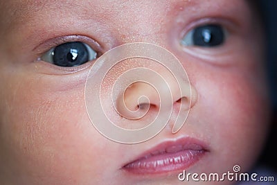 Serious baby face closeup Stock Photo