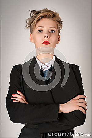 Serious business woman in black suit Stock Photo