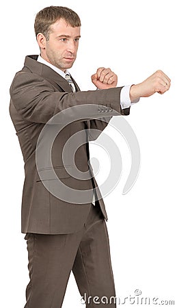 Serious businessman as succesful fighter Stock Photo