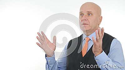 Serious Businessman Image Making Hand Gestures and Talking Stock Photo