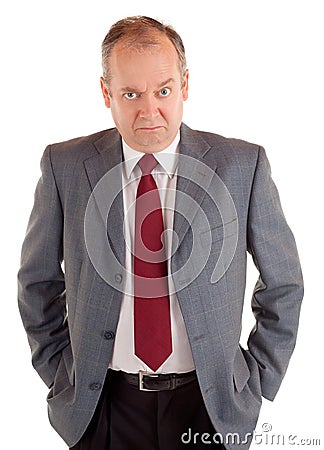 Serious Businessman with a Scowling Expression Stock Photo