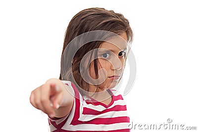Serious girl pointing towards the viewer Stock Photo