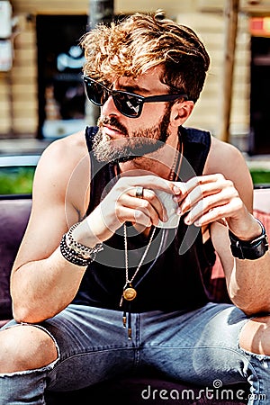 Serious hipster man drinking espresso Stock Photo