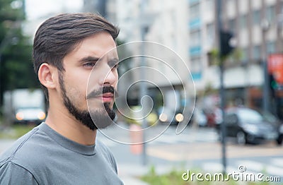 Serious hispanic guy with beard Stock Photo