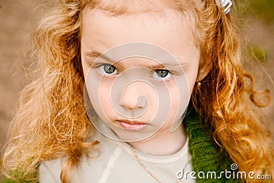 Serious little girl Stock Photo