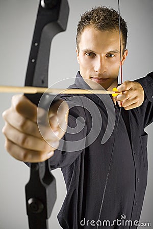 Serious man with bow Stock Photo