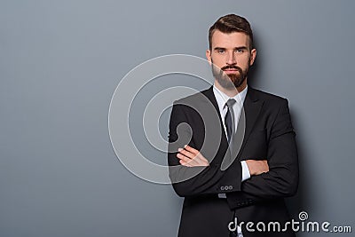 Serious man with crossed arms Stock Photo