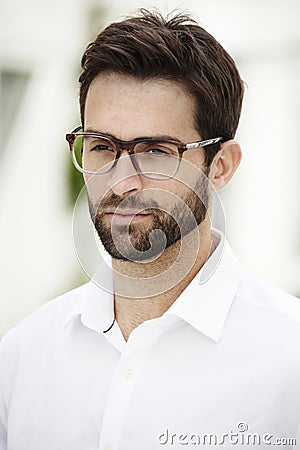 Serious man wearing glasses Stock Photo