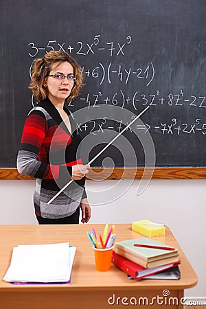 Serious math teacher explaining Stock Photo