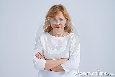 Serious mature woman posing Stock Photo